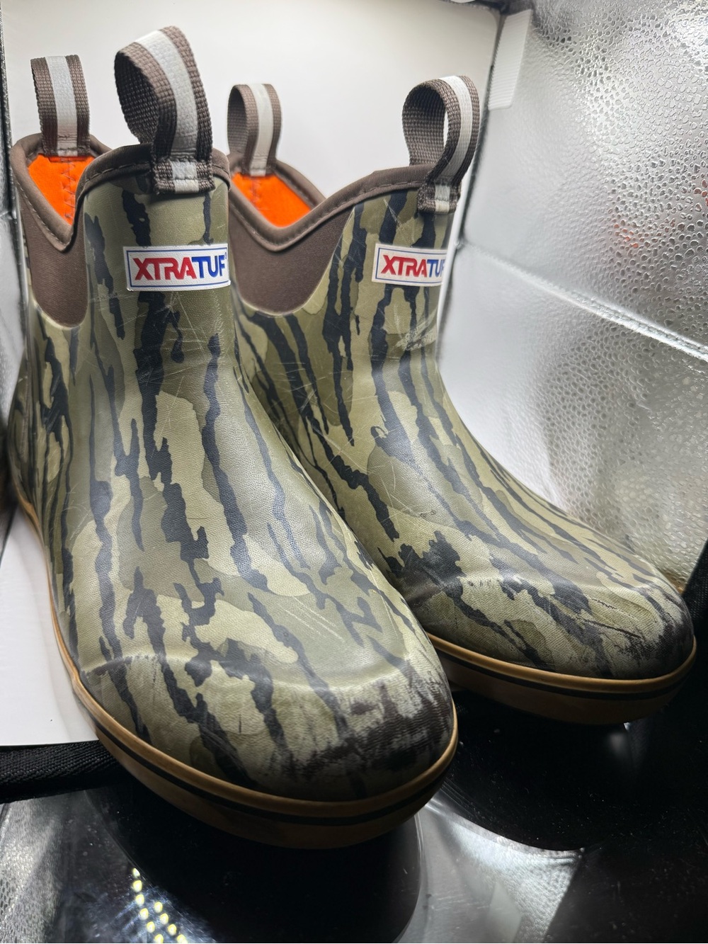 Men’s These are the XTRATUF Men's Mossy Oak Bottomland Ankle Deck Boots, featuri